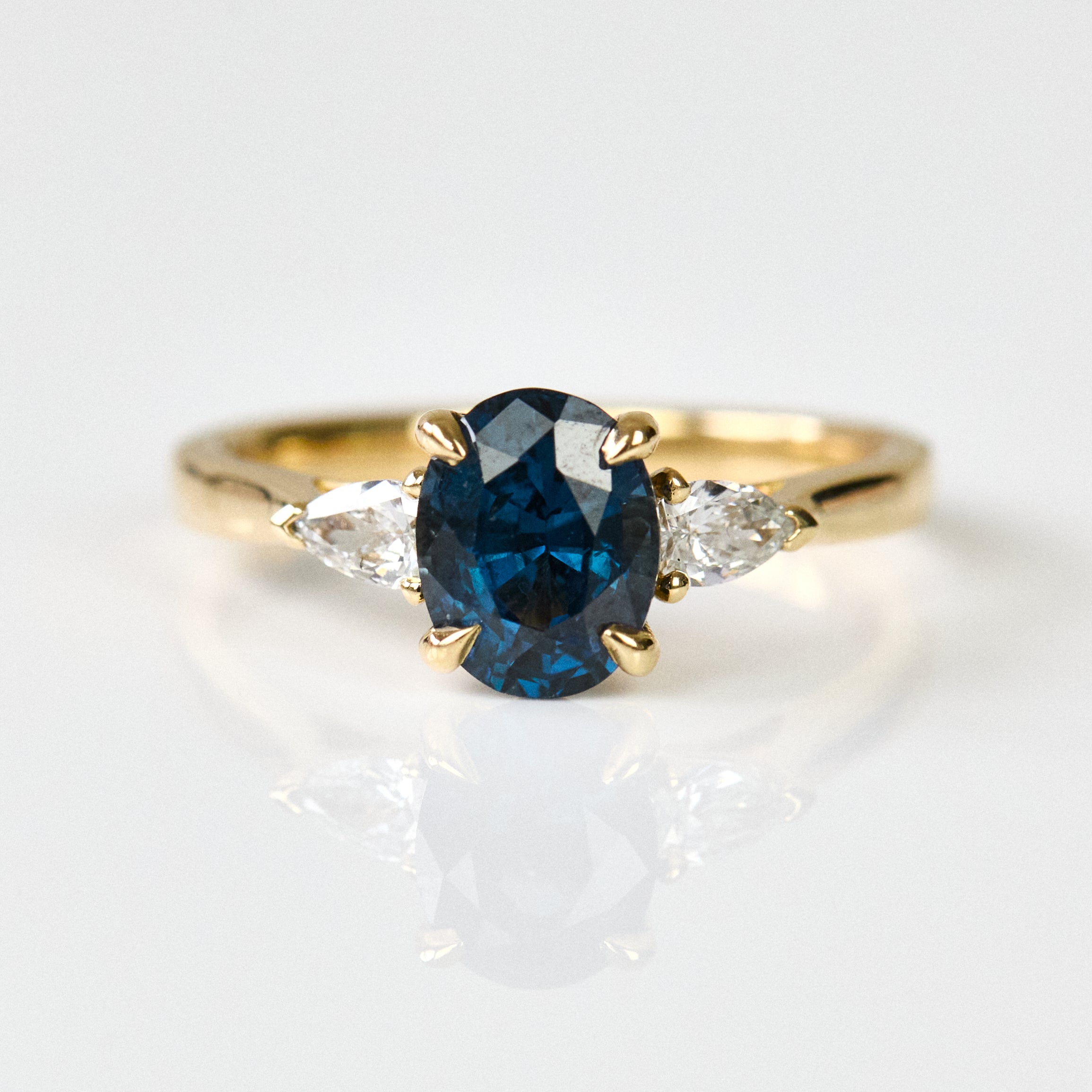 ​Teal sapphire rings