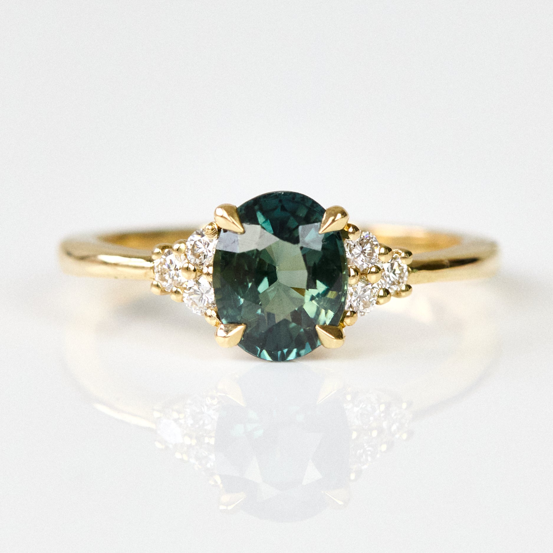 Teal sapphire rings