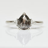 Platinum salt and pepper pear diamond engagement trilogy ring