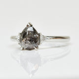 Platinum salt and pepper pear diamond engagement trilogy ring